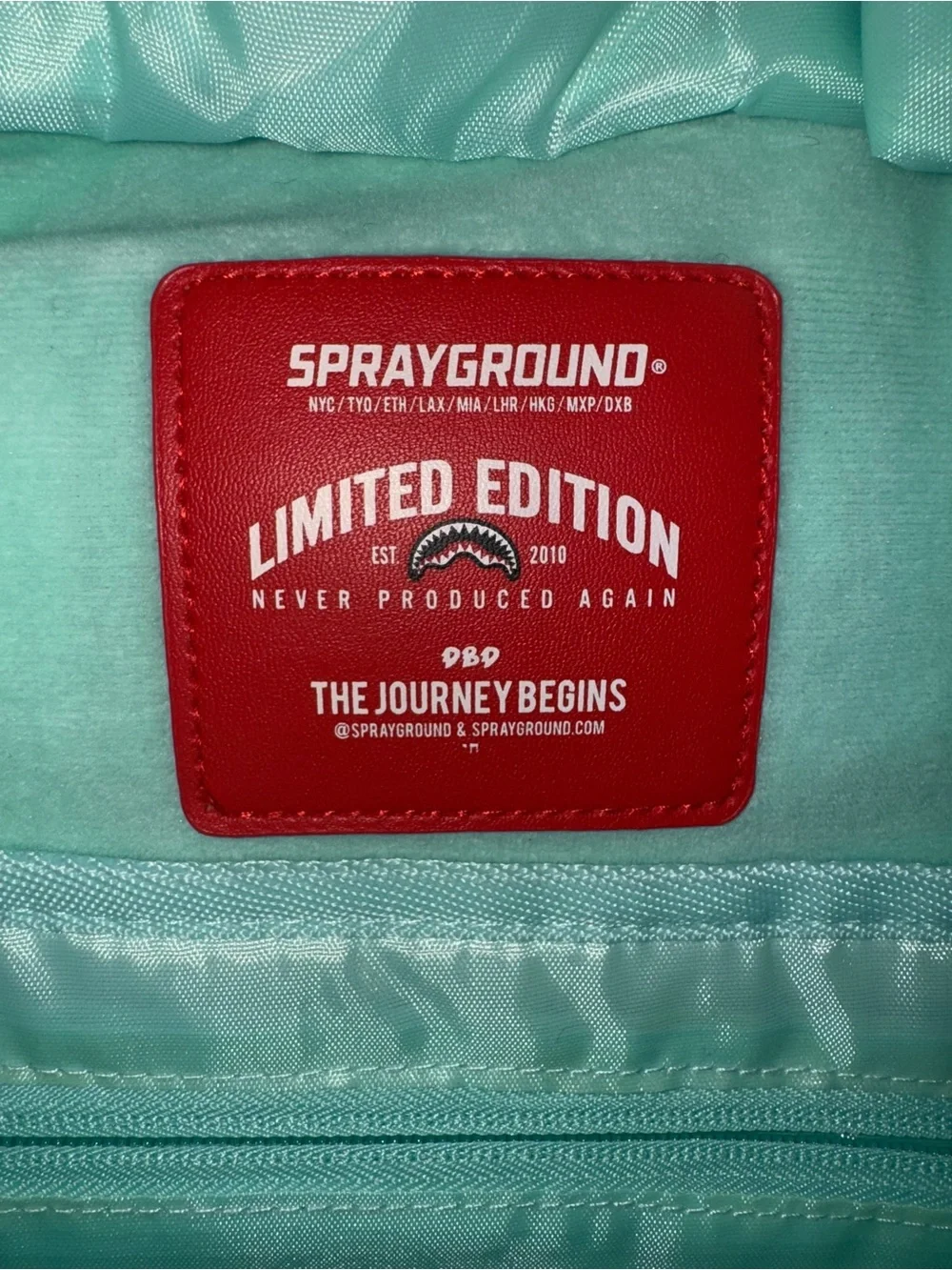 Sprayground White Backpack with Multicolor Planet Patches
